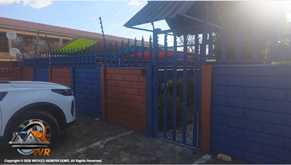 Daycare Renovation in Randfontein: Complete Repairs and Fresh Midnight Blue & Hacienda Paint Finish